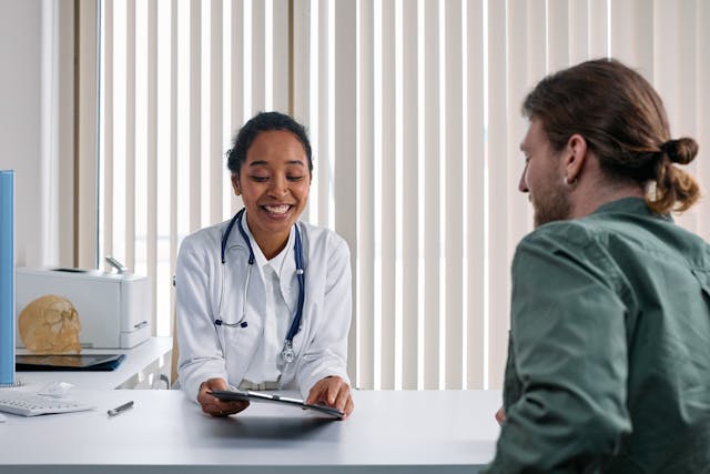 Doctor speaking with a patient in a medical office